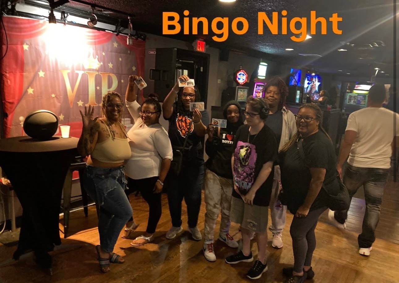 Group celebrating Bingo Night indoors